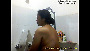 Sexy Indian Bengali Aunt Mili captured in bathroom Part 1