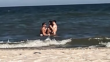 YOUNG COUPLE GETS CAUGHT FUCKING IN THE SEA