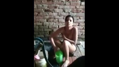 Daughter pissing in bathroom