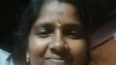 Tamil horny aunty showing her boobs with audio