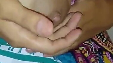 Hot Indian Wife squeezing milk into the glass