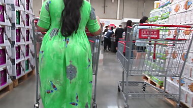 Huge MILF Indian booty under a colorful dress