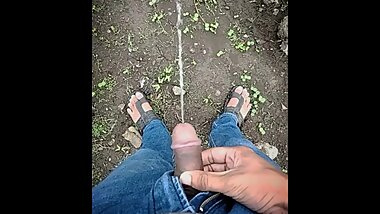 Indian desi man peeing in jungle