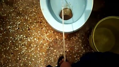 college teenager pissing in public toilet